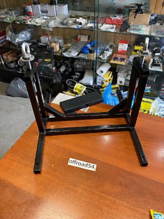 Фиксатор мотоцикла в прицепе